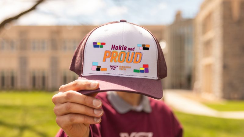 A maroon and white Hokie and Proud hat