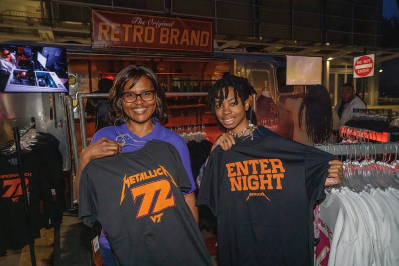 Hokies hold up Metallica shirts
