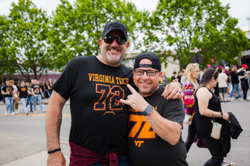 Fans pose together before the Metallica concert